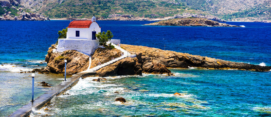 Wall Mural -  Greece travel. Leros island in Dodecanese - Agios Isidoros church .The little chapel in the sea.