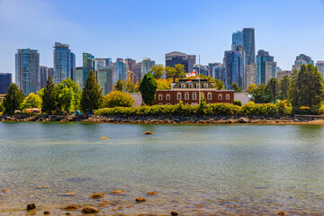 Wall Mural - HMCS Discovery naval station museum on Deadman’s Island with rainbow flag for Gay Pride in Vancouver Canada