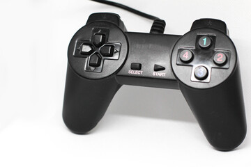 Isolated black game controller.