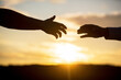 Giving a helping hand. Friendly handshake, friends greeting, teamwork, friendship. Rescue, helping gesture or hands. Outstretched hands, salvation, help silhouette, concept of help