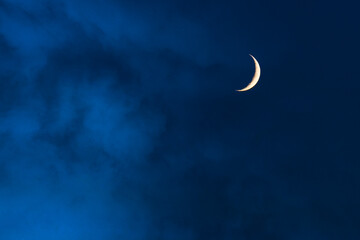 Wall Mural - blue foggy sky with crescent or half moon