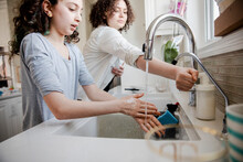 Girls Washing Hands With Soap