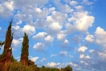 Wall Mural - White clouds above the hill in Korcula town, Croatia