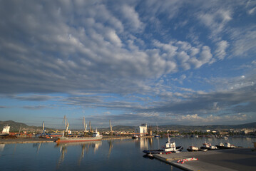 
6/21/2020 Greece, Volos, commercial port east of the sun