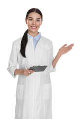 Poster - Happy young woman in lab coat with clipboard on white background