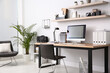 © New Africa - Modern computer on table in office interior. Stylish workplace