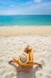 © Netfalls - Young woman on the white sand beach