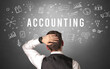 © ra2 studio - Rear view of a businessman with ACCOUNTING inscription, modern business concept