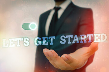 Wall Mural - text sign showing lets get started. business photo text encouraging someone to commence or begin doi
