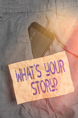 Fototapete - Writing note showing What S Your Story Question. Business concept for Share or tell us your life experiences and success Smartphone device inside trousers front pocket note paper