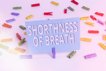 Text sign showing Shorthness Of Breath. Business photo text intense tightening of the airways causing breathing difficulty Colored clothespin papers empty reminder white floor background office