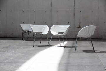 Wall Mural - White modern chairs in the empty building