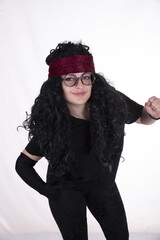 Canvas Print - Vertical shot of a female with long curly black hair posing on a white background