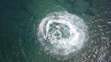 Aerial Shot, Two Jetsurf Riders Performing Action Maneuvers In Ocean