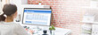 © Andrey Popov - Filling Online Survey Form On Computer At Desk