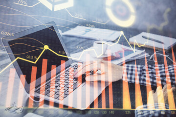 Double exposure of forex chart with man working on computer on background. Concept of market analysis.