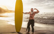© Alessandro Biascioli - Happy fit senior having fun surfing at sunset time - Sporty bearded man training with surfboard on the beach - Elderly healthy people lifestyle and extreme sport concept