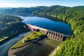 Roznow dam, lake and hydroelectric power plant on the Dunajec River in Poland. Aerial view. Early morning in spring