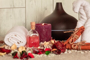 Poster - Spa essentials for aromatherapy including towel and natural oil