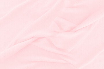 Soft pink fabric texture background. Abstract cloth silk for wallpaper or backdrop