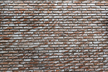 Closeup of modern brick wall pattern background in modern building