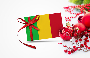 Mali flag on new year invitation card with red christmas ornaments concept. National happy new year composition.