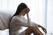 Upset distressed young woman sit on floor in bedroom cry having emotional personal problems breakup or divorce, depressed sad female feel down stressed suffer from infertility or depression at home