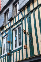 Wall Mural - Half-timbered house with flower pots on the wall in Rouen, Normandy, France