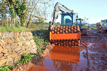 Wall Mural - Compactor on a road construction site