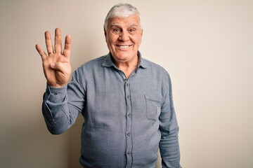 Wall Mural - Senior handsome hoary man wearing casual shirt standing over isolated white background showing and pointing up with fingers number four while smiling confident and happy.