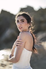 Poster - Brunette caucasian bride posing at the beach