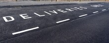 Painted Marking On The Road Showing The Parking Bay Is For Deliveries Only