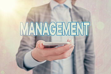 Poster - Conceptual hand writing showing Management. Concept meaning the authoritative act of directing or controlling things Touch screen digital marking important details in business
