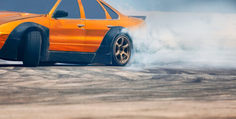 Race drift car burning tires on speed track