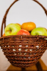 Sticker - Close up shot of juicy fruit basket containing apples and tangerines