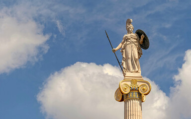 Athena marble statue on Ionic column and partly cloudy sky, space for text