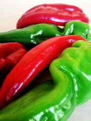 Wall Mural - Closeup picture of red and green serrano peppers