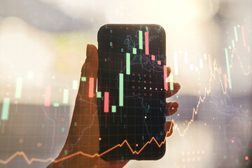 Poster - Multi exposure of abstract financial graph with world map and hand with mobile phone on background, financial and trading concept