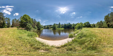 Wall Mural - seamless spherical hdri panorama 360 degrees angle view on grass coast of small lake or river in sunny summer day and windy weather with beautiful clouds in equirectangular projection, VR content