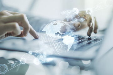 Poster - double exposure of robotics technology with world map hologram and hands typing on laptop on backgro
