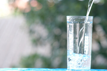 Sticker - glass of water with blue background