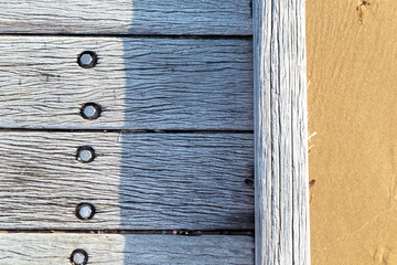 Weathered beach jetty sunny sand 