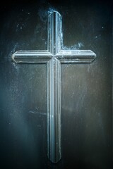 Sticker - Vertical shot of a Christian cross on a dark damaged wall texture