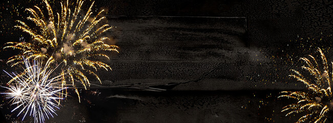 Wall Mural - fireworks, colorful sylvester-fireworks on black background with sparks and space for text