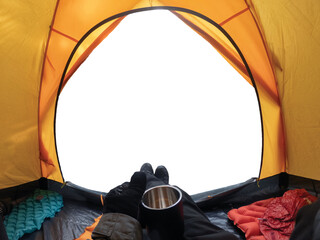 Wall Mural - camping with hand holding cup in yellow tent open on background