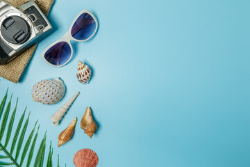 Wall Mural - The beach accessories on the blue and blue background. Summer sale beautiful web banner.