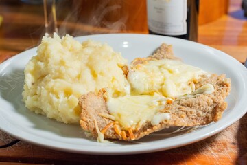 Canvas Print - Closeup shot of a mashed potato with cheese