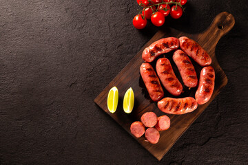 Wall Mural - Fresh grilled Pepperoni sausage. Grilled Pepperoni Sausage on wooden board. 