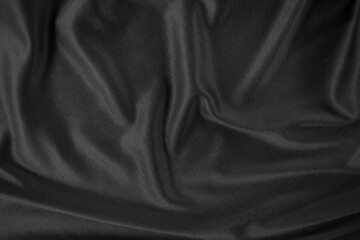 Background texture black cloth. Abstract dark wavy soft. Fabric is wrinkled. Fashion luxury style.