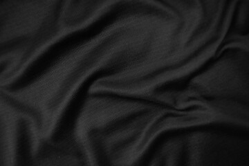 Background texture black cloth. Abstract dark wavy soft. Fabric is wrinkled. Fashion luxury style.